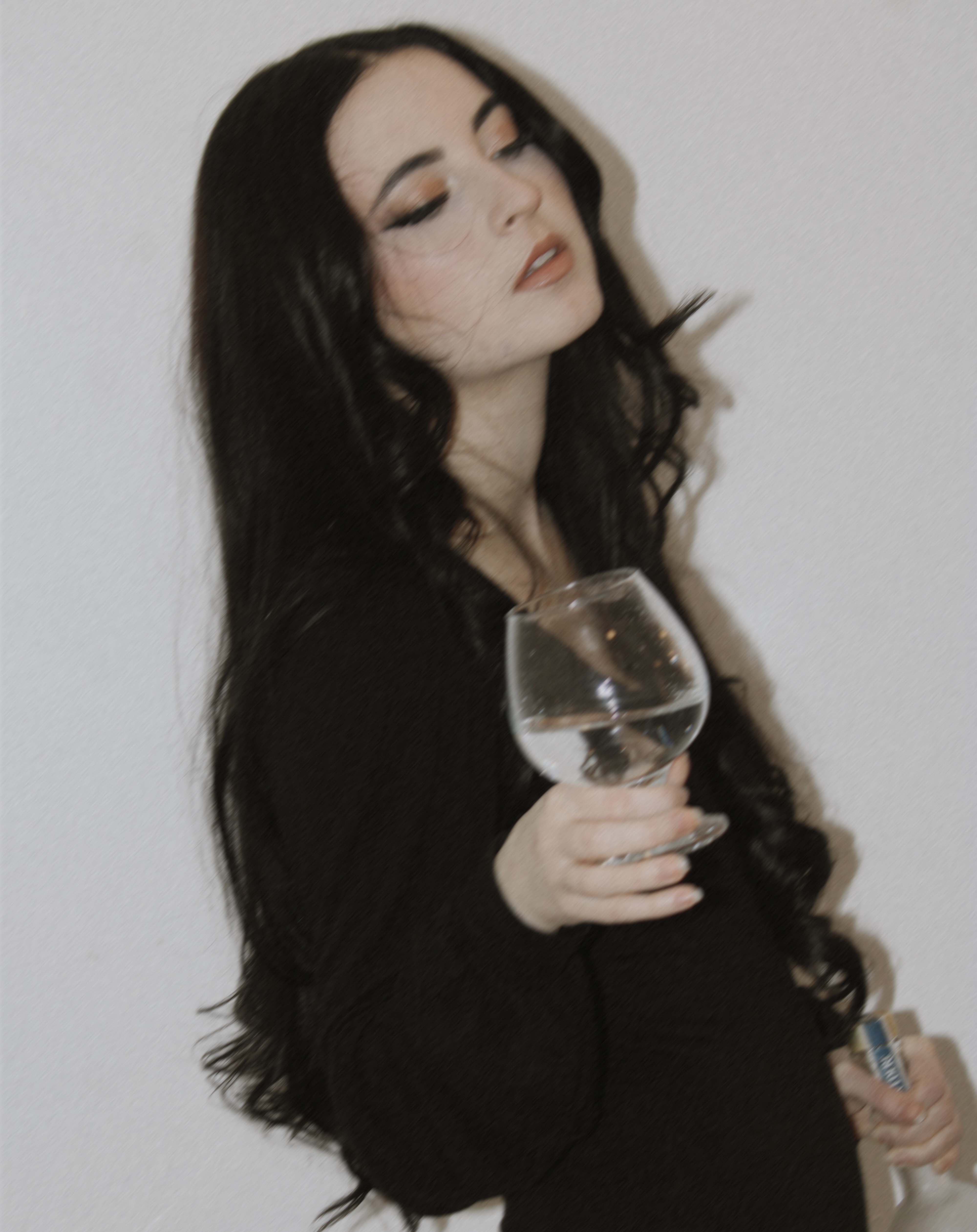 Portrait of Eponine Lorenzi holding a glass of water